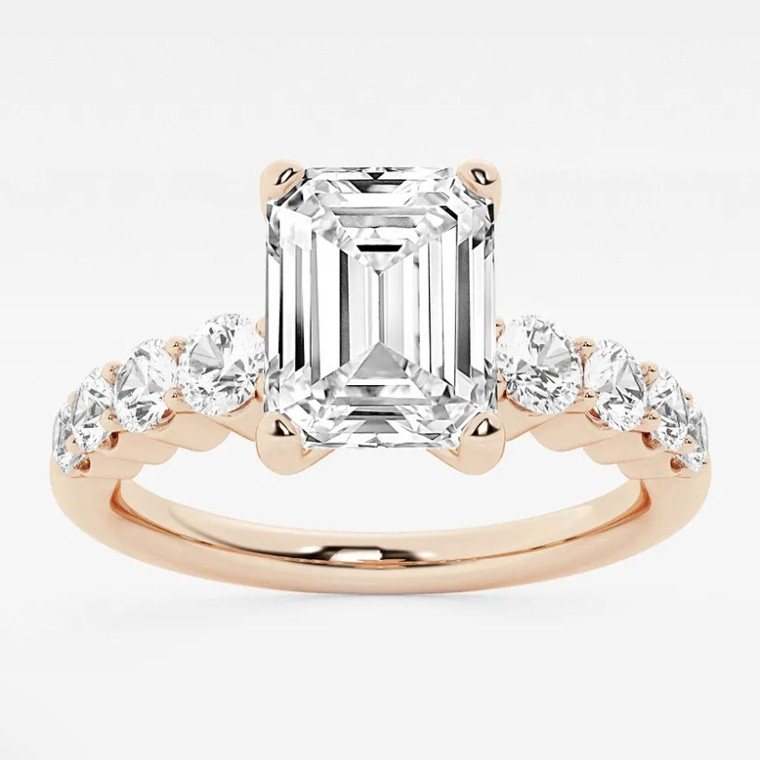 Emerald-cut diamond engagement ring in rose gold