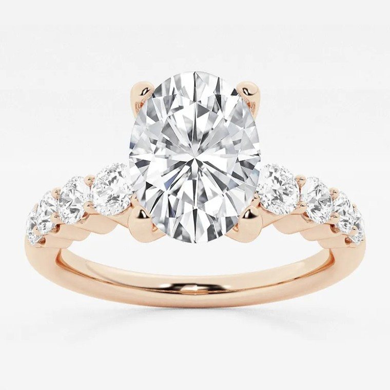 Oval-cut diamond engagement ring in rose gold