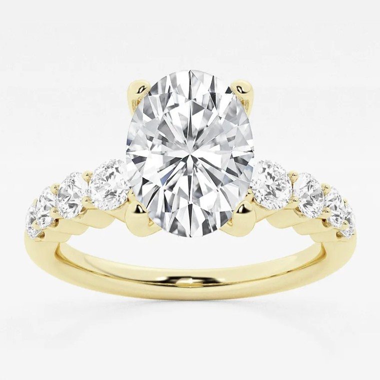 Oval-cut diamond engagement ring in yellow gold
