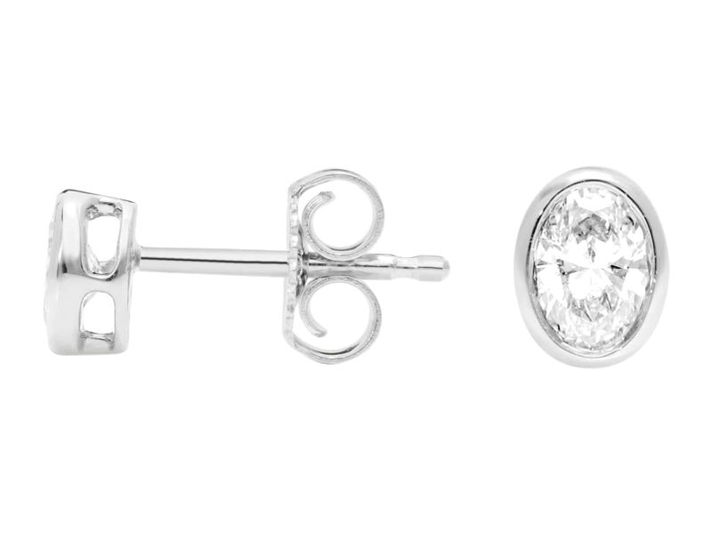 Oval Bezel Studs in white gold, side view
