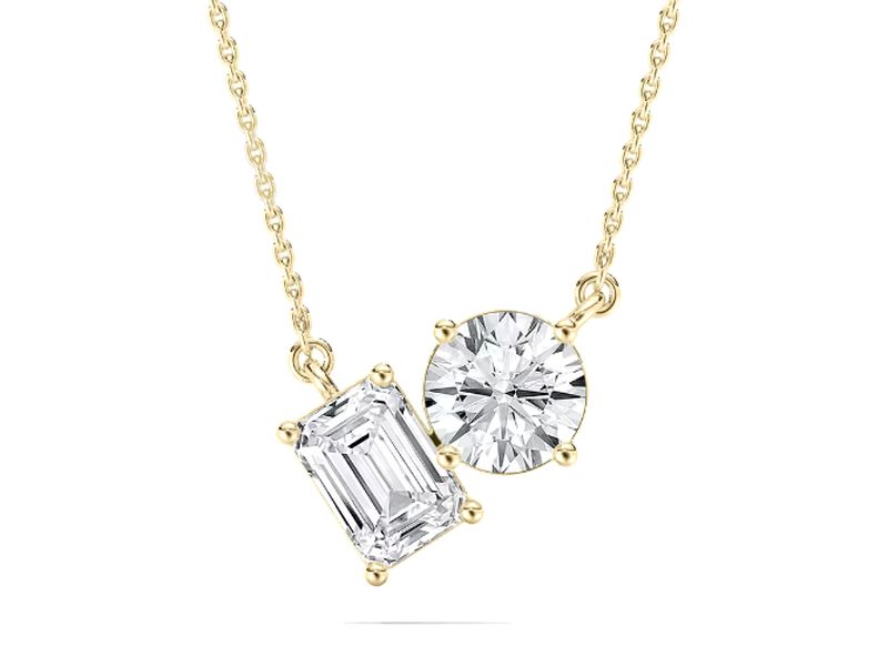 Round & Emerald Toi et Moi Pendant in yellow gold