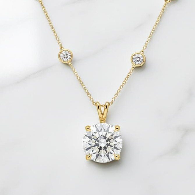 Round lab diamond solitaire pendant in yellow gold